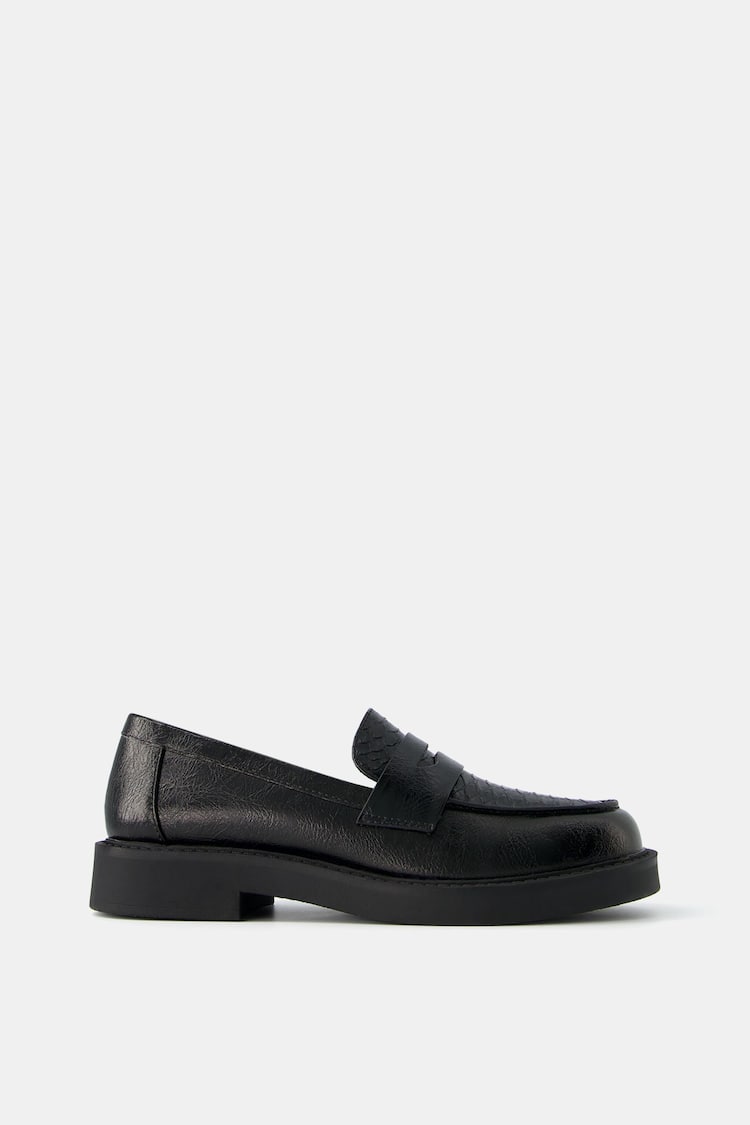 Flat black loafers