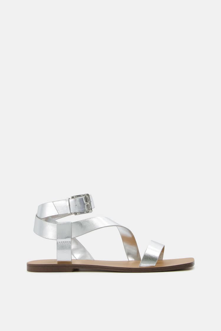 Flat sandals with ankle strap