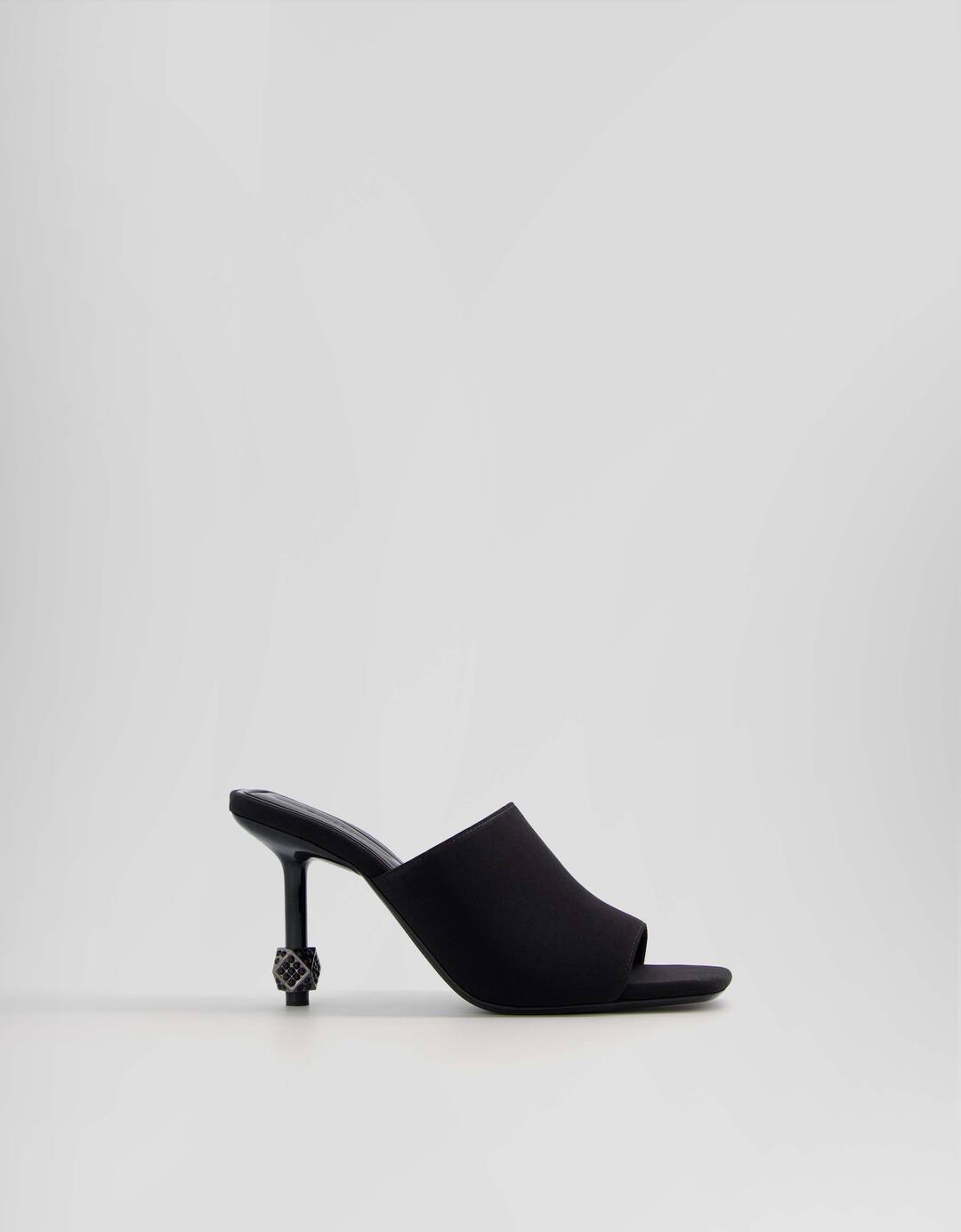 High-heel mules with detail on the heel
