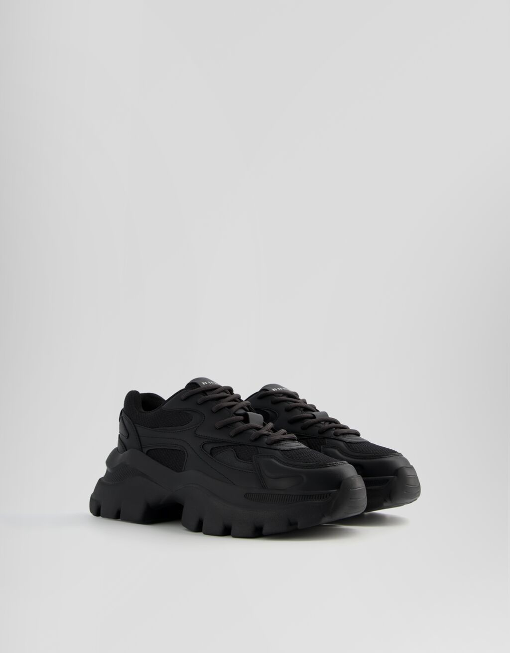 Black studded trainers outlet