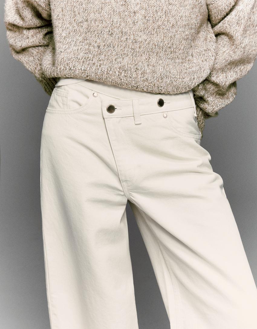 Çapraz bel detaylı yüksek bel geniş paça jean-Krem