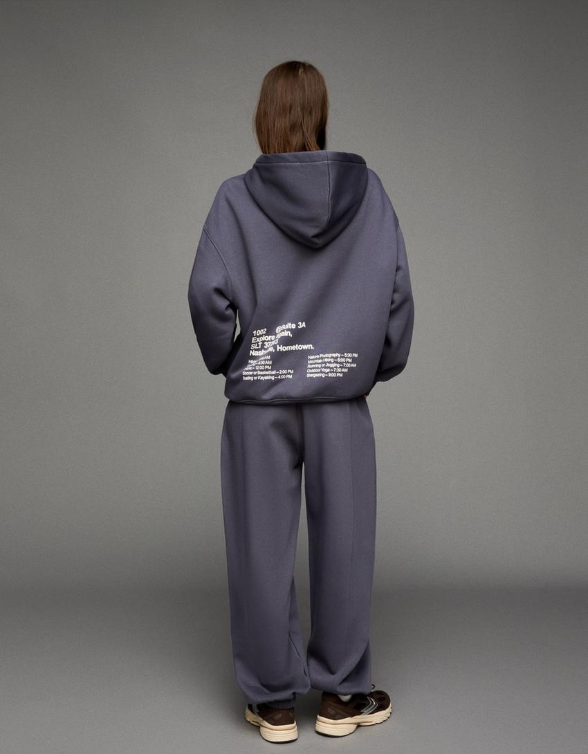 Pantaloni jogger fit stampati COMBO WINS Donna Bershka