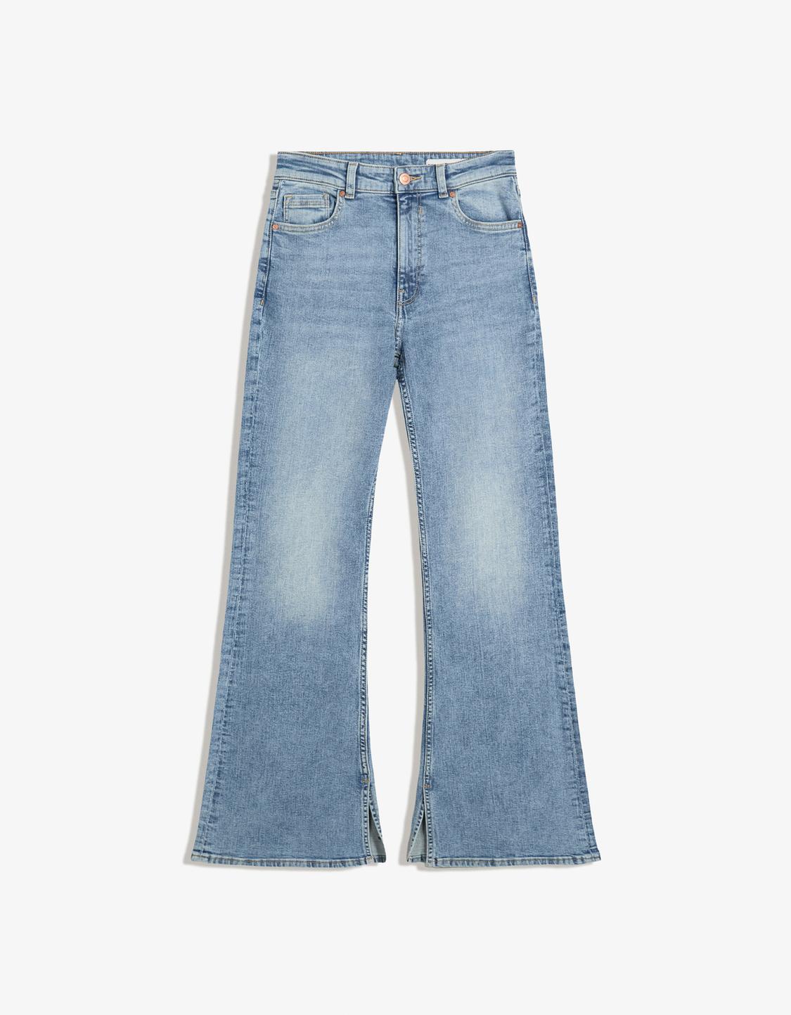 Flared jeans with slit