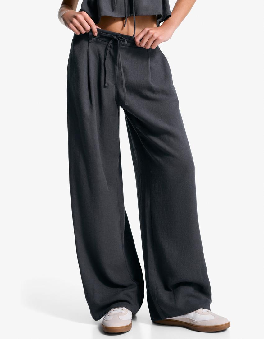 Wide-leg trousers with pleats-Grey