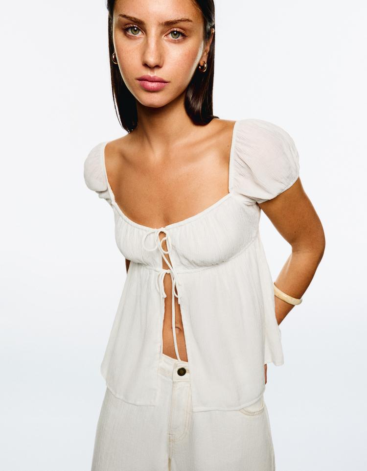 Textured printed top with bows