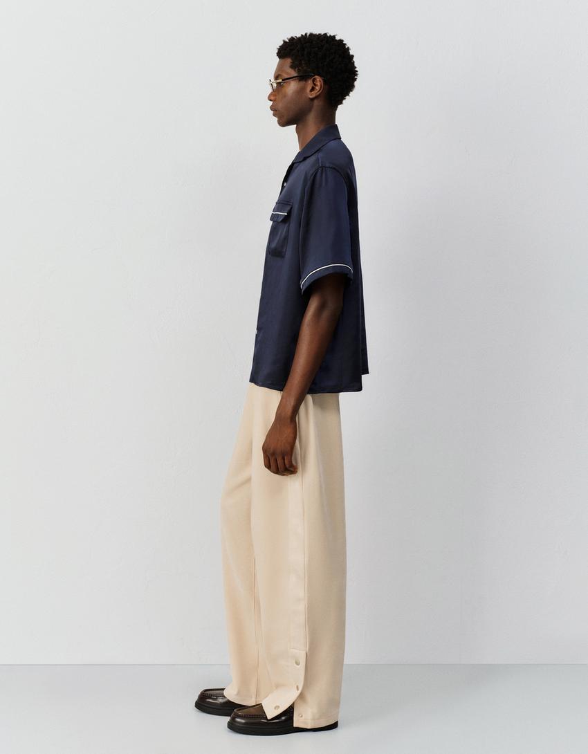 Pantaloni balloon fit jogger con borchie-Avorio