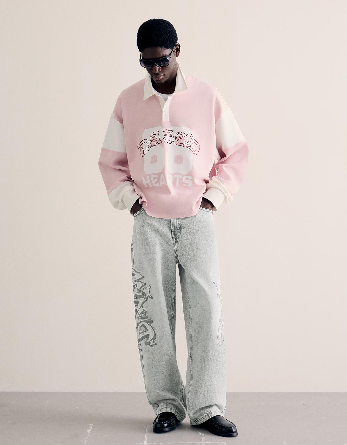 Bershka jeansy o kroju super baggy z naszywką szary