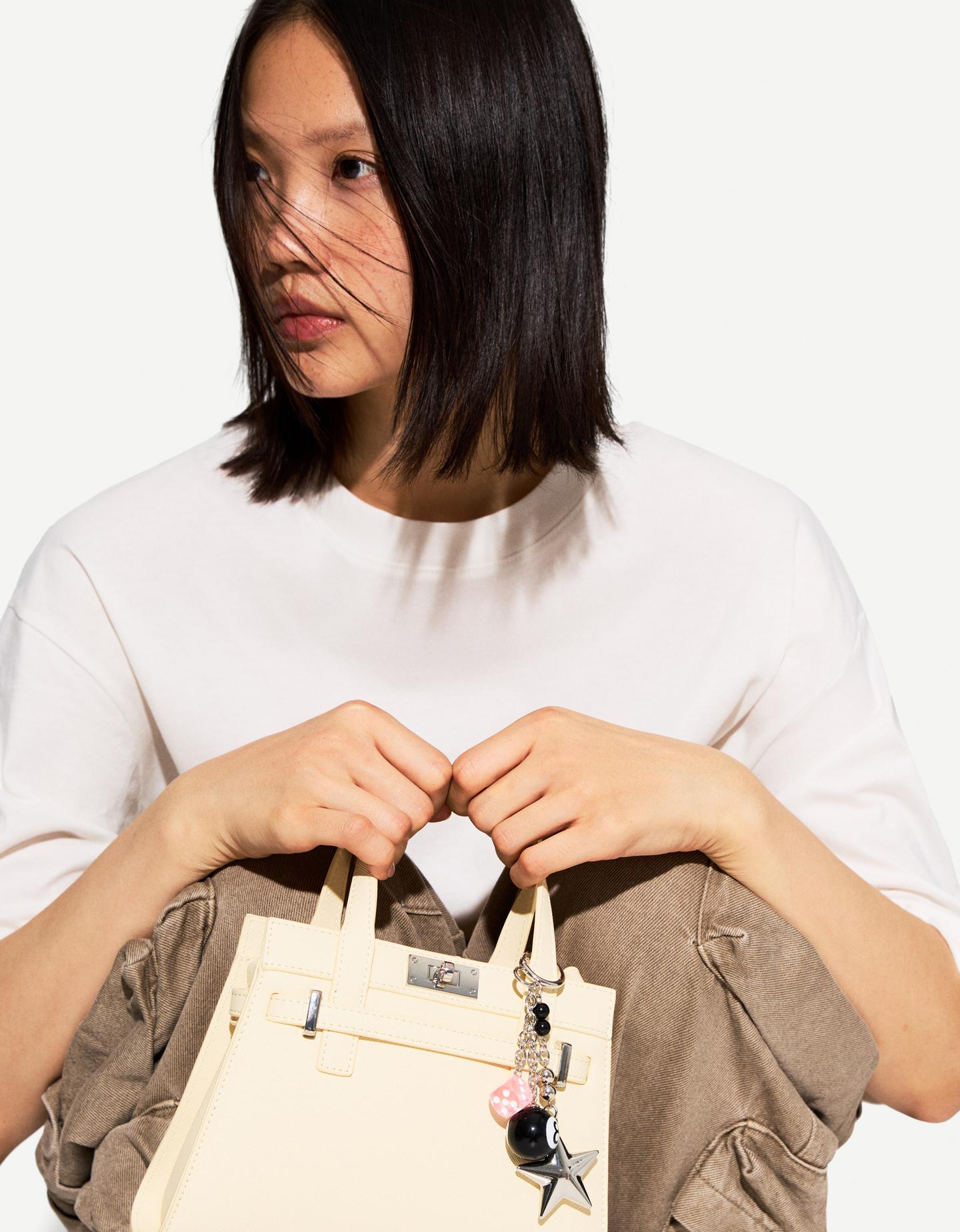 Bershka brelok z gwiazdką srebrny