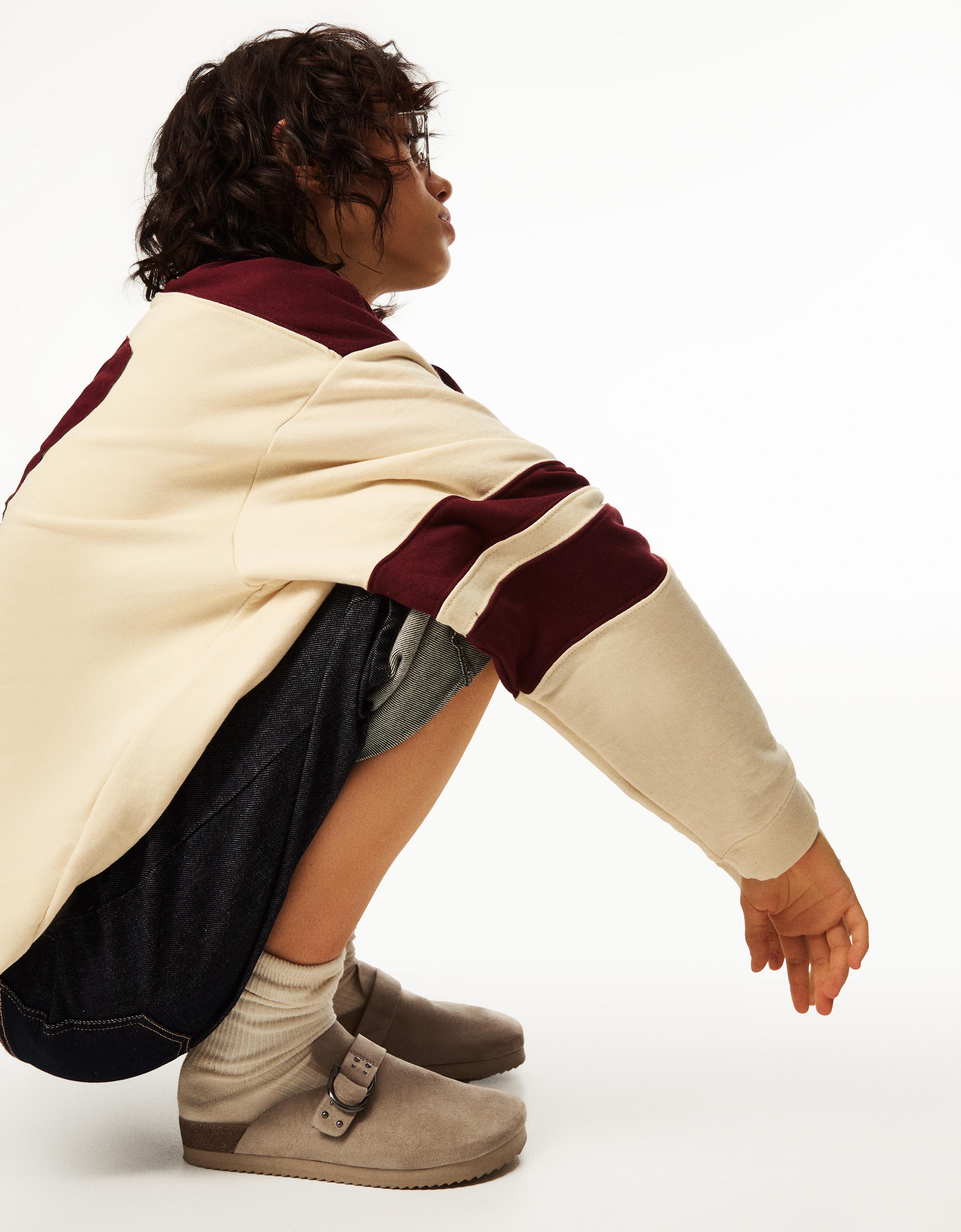 Buckled clogs with stud details - Women | Bershka Buckled clogs with stud details - Women | Bershka