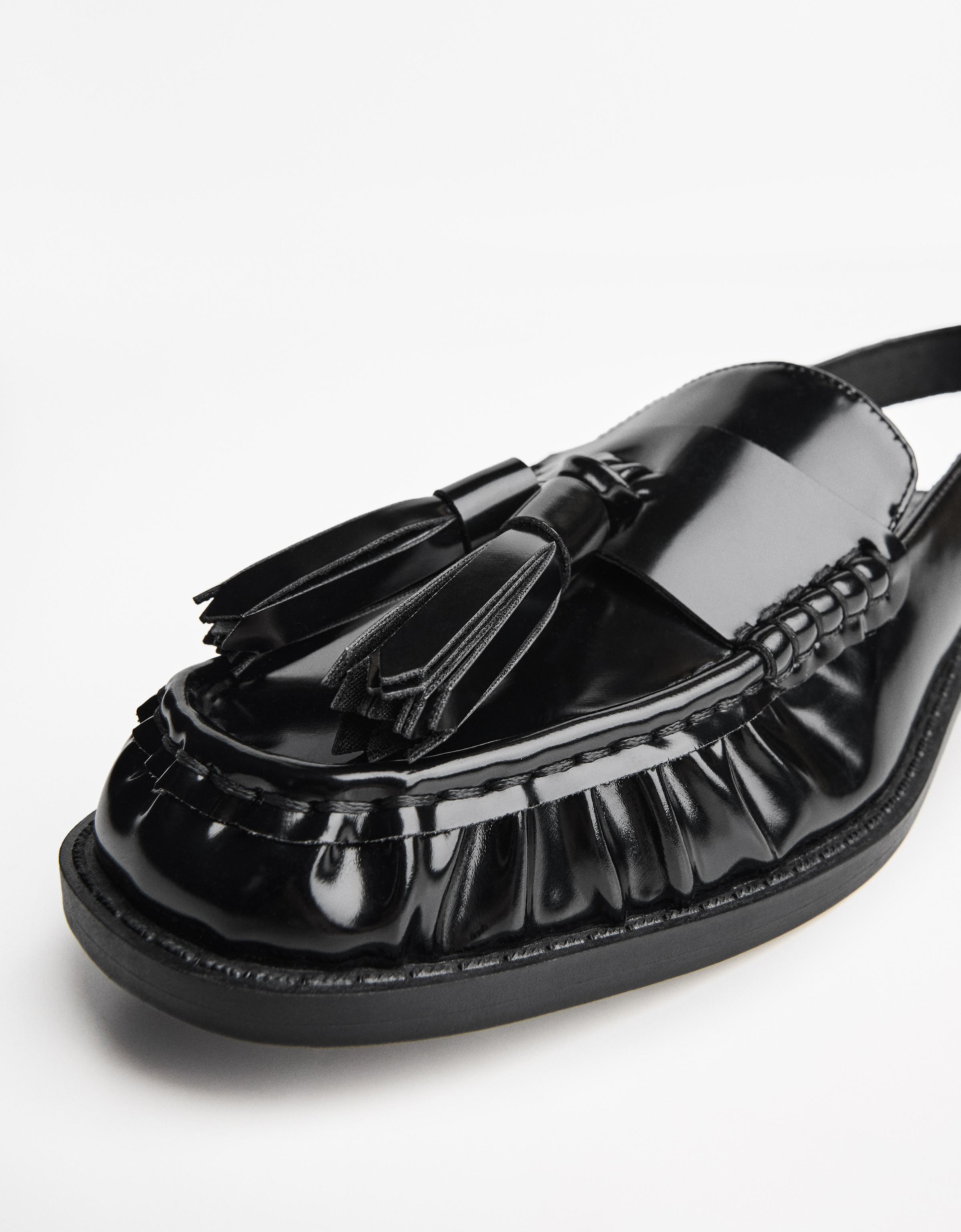 Backless tassel loafers — BLACK