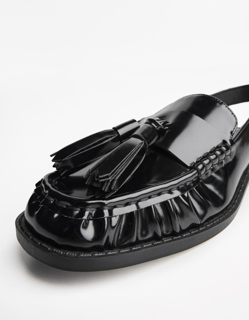 Mocasín borlas destalonado-Negro-1