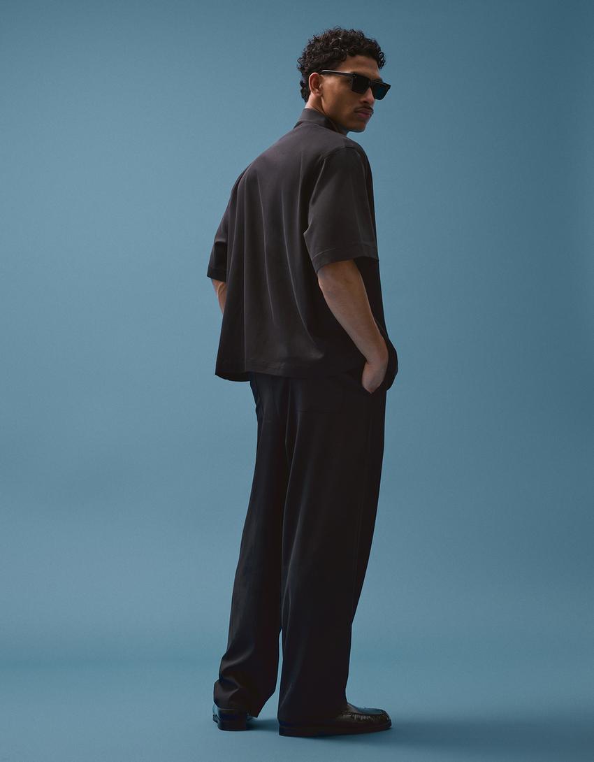 Calças super baggy fit fluidas com pinças-Preto