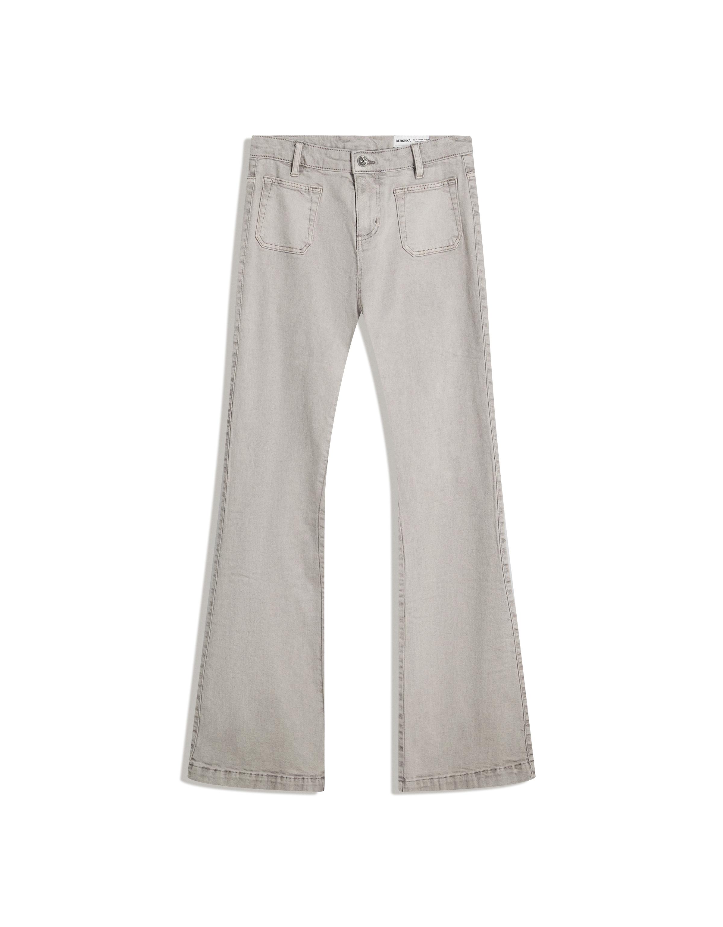 Flare trousers with flaps and pocket