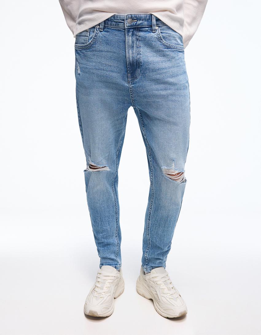 Carrot fit jeans met scheuren-Lichtblauw