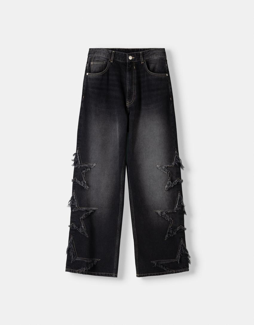 Baggy jeans with stars - Men | Bershka