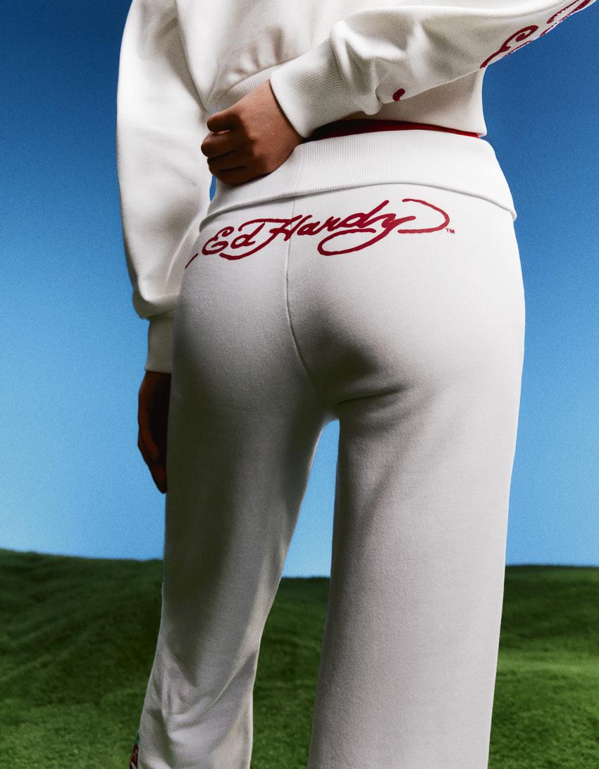 Pantalon flare ED HARDY X BERSHKA-Blanc cassé