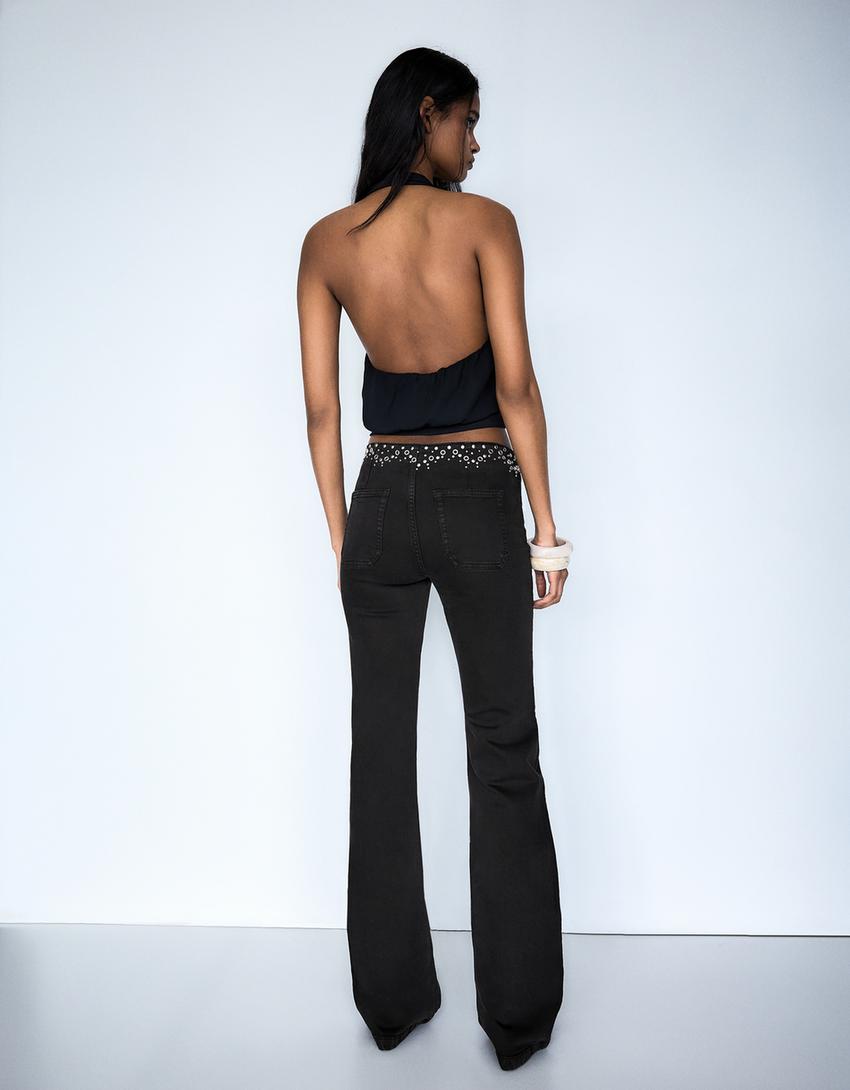 Pantalón cintura tachas-Negro