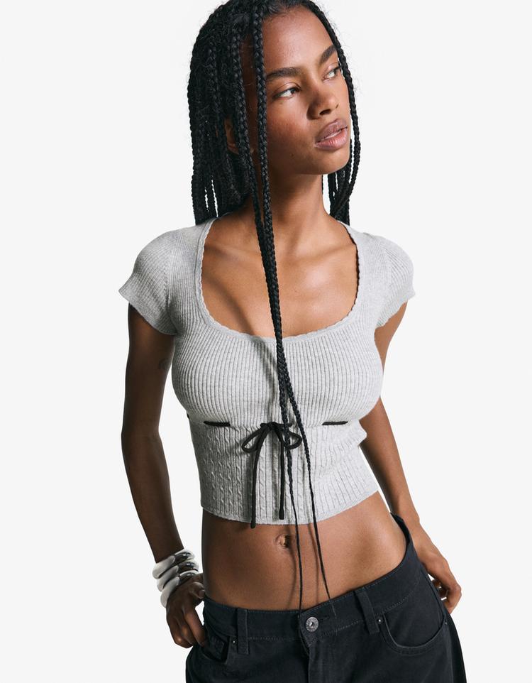 Jersey manga corta trenzado lazo