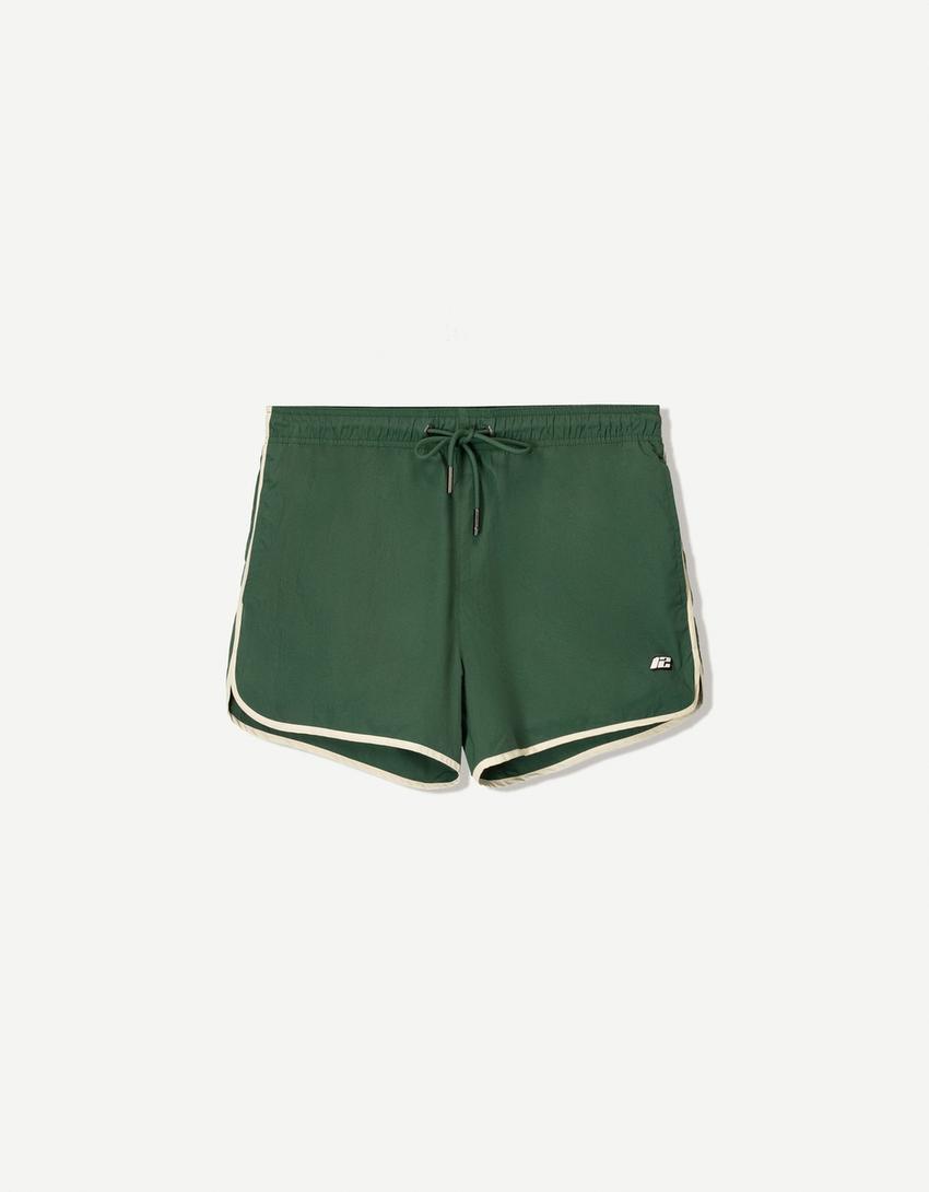 Short swimming trunks with trim-Green