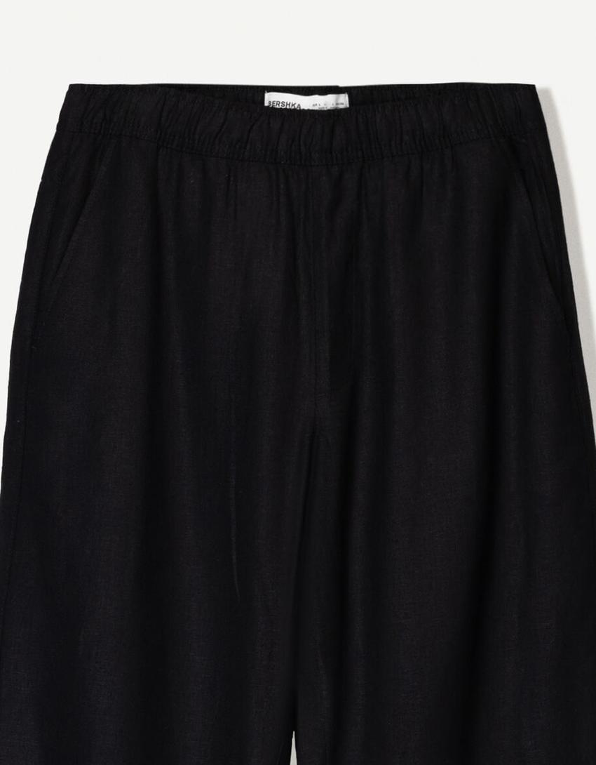 بنطلون رياضي بمزيج كتاني وساق عريضة-أسود