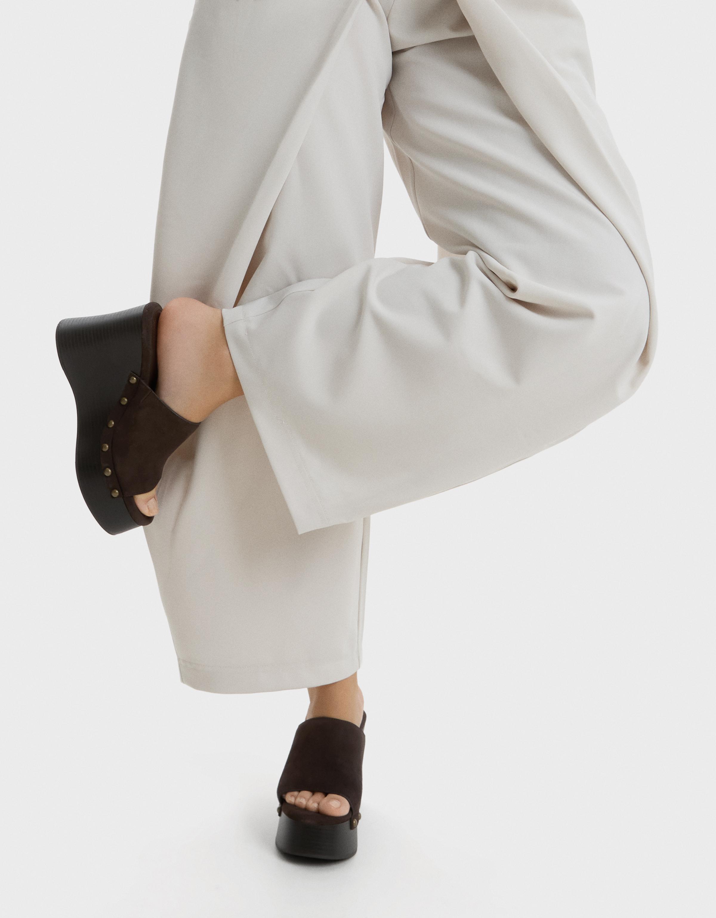 Leather wedge with stud detail — Brown
