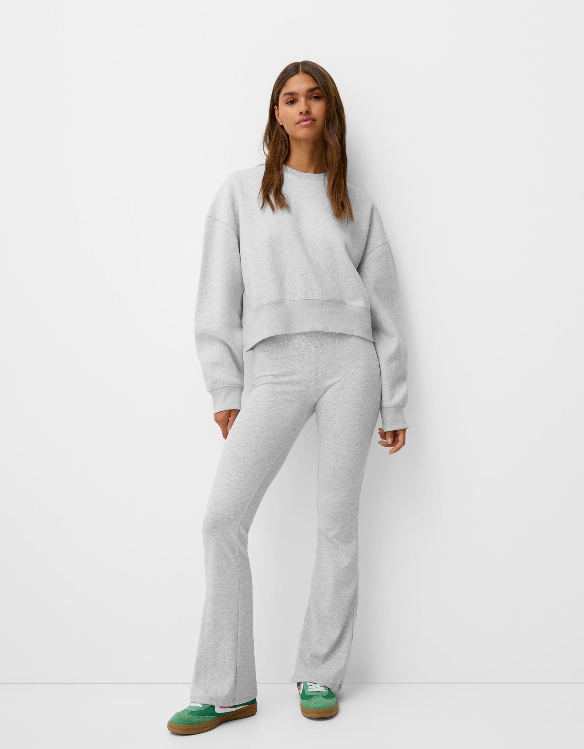 Pantaloni a campana vita canneté Donna Bershka