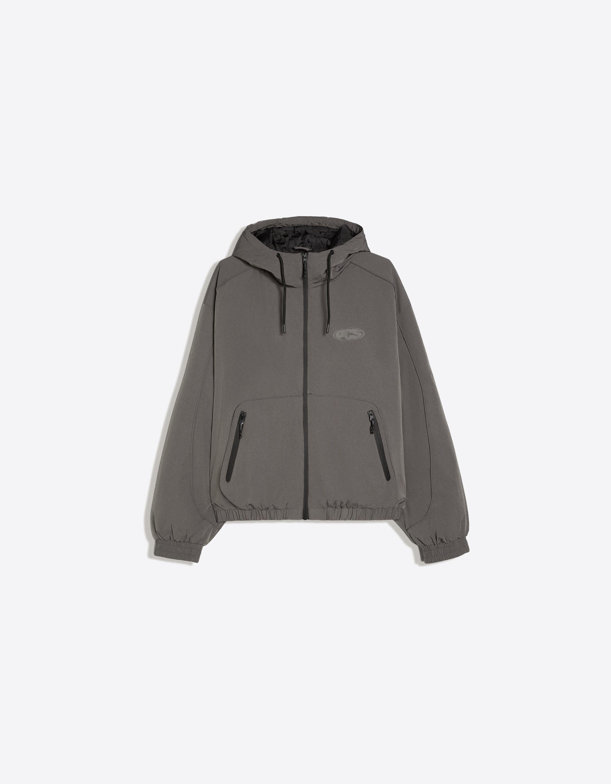Technical hooded jacket — Grey