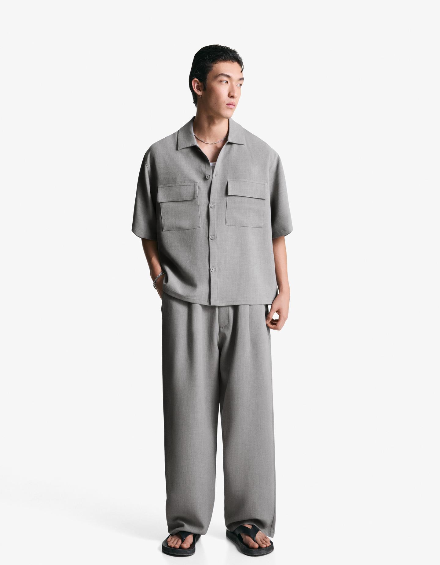 Bershka spodnie superbaggy tailoring szary