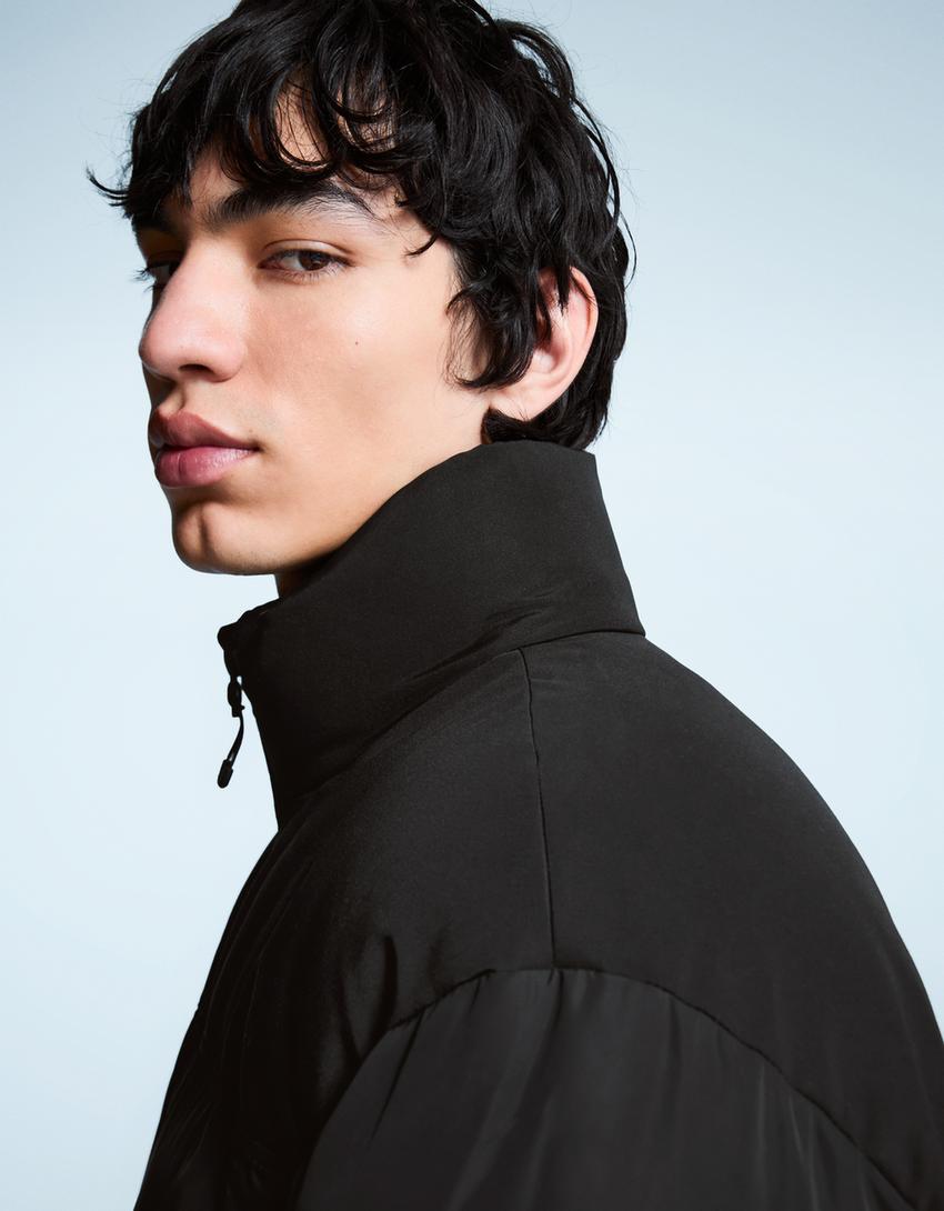Technical puffer jacket