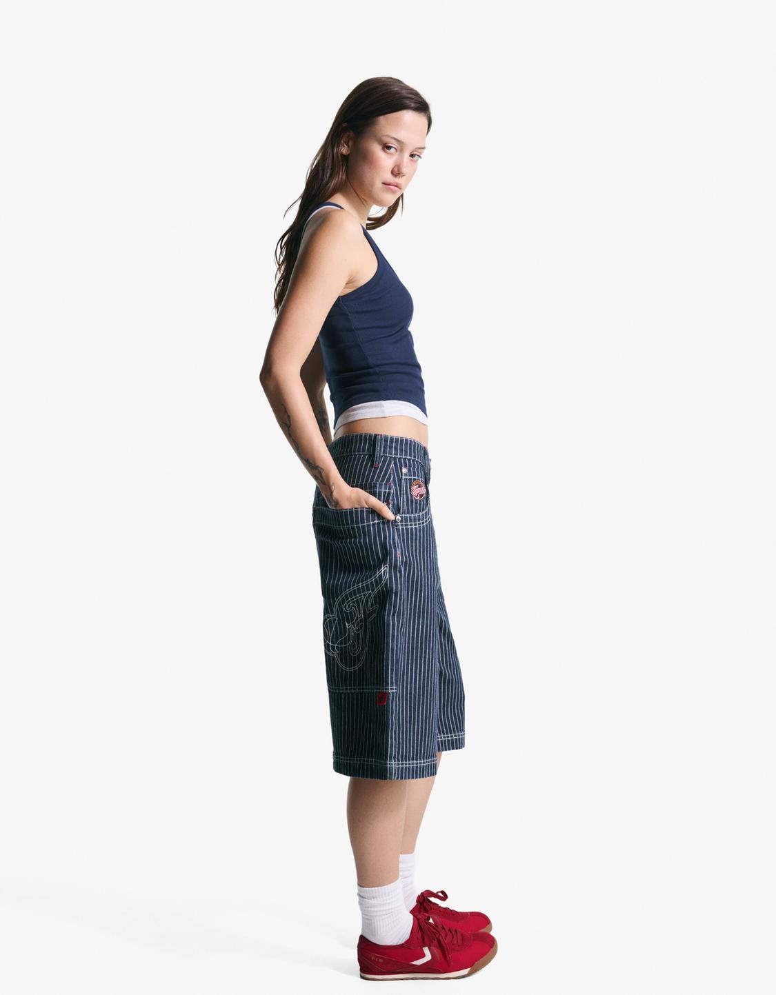 WNBA-bermudashorts i denim og skater-stil