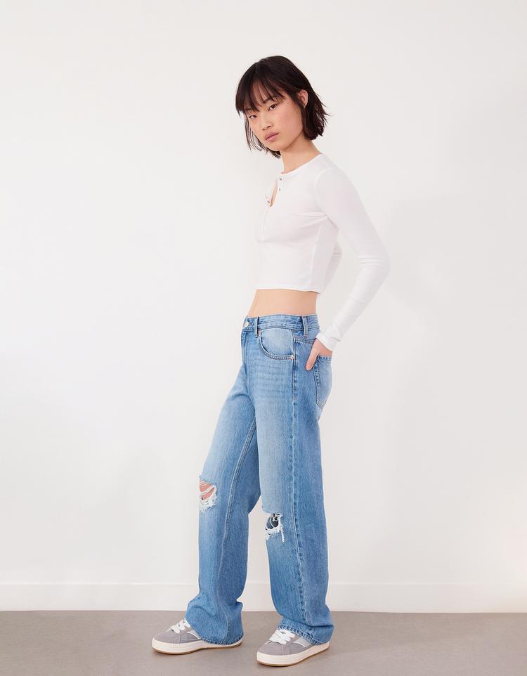 Distressed wide leg 90’s jean