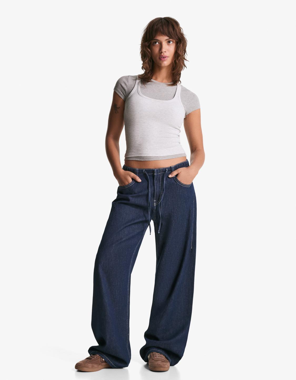 Jeans wide leg cordón