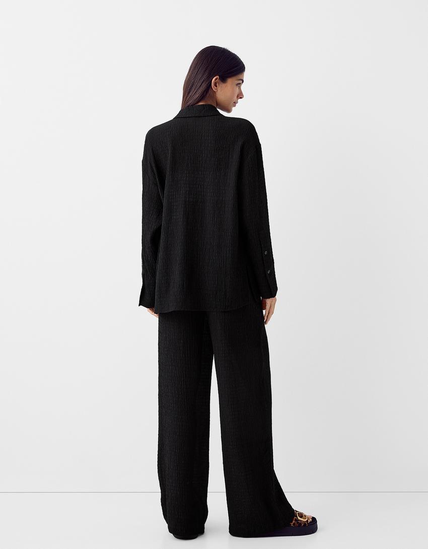 قميص فضفاض بملمس بارز وأكمام طويلة-أسود-1