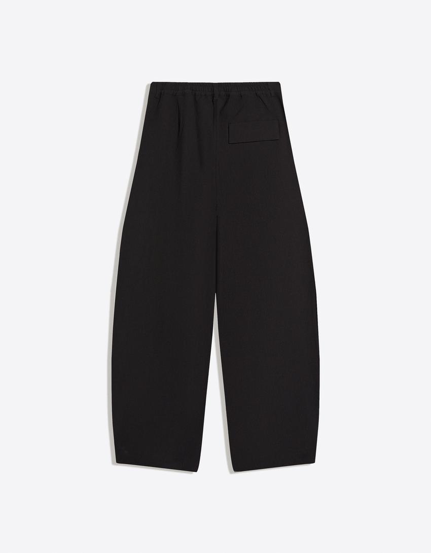 Plisowane spodnie o kroju super baggy semijogger-Czarny