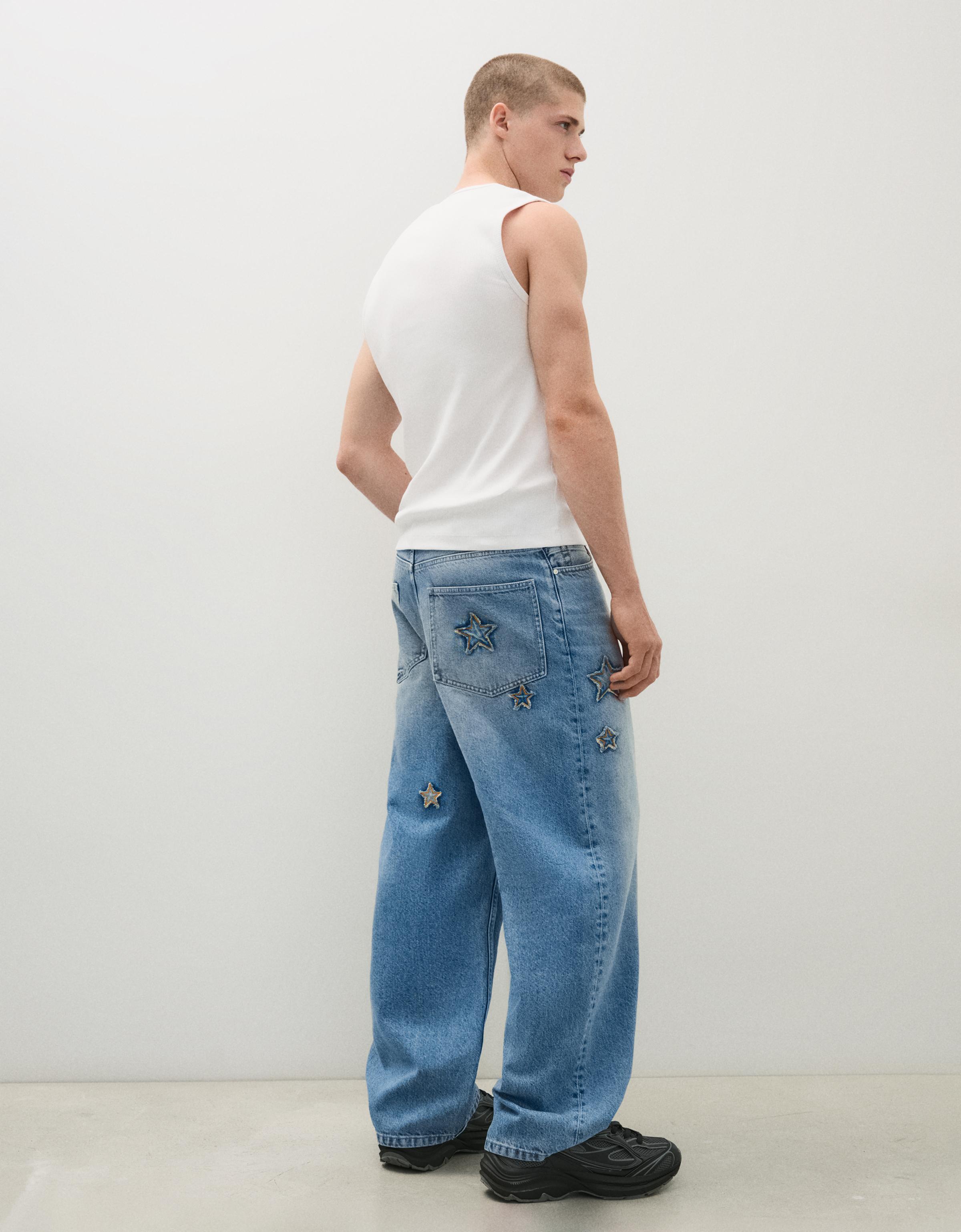 Baggy jeans with star patches — Light blue