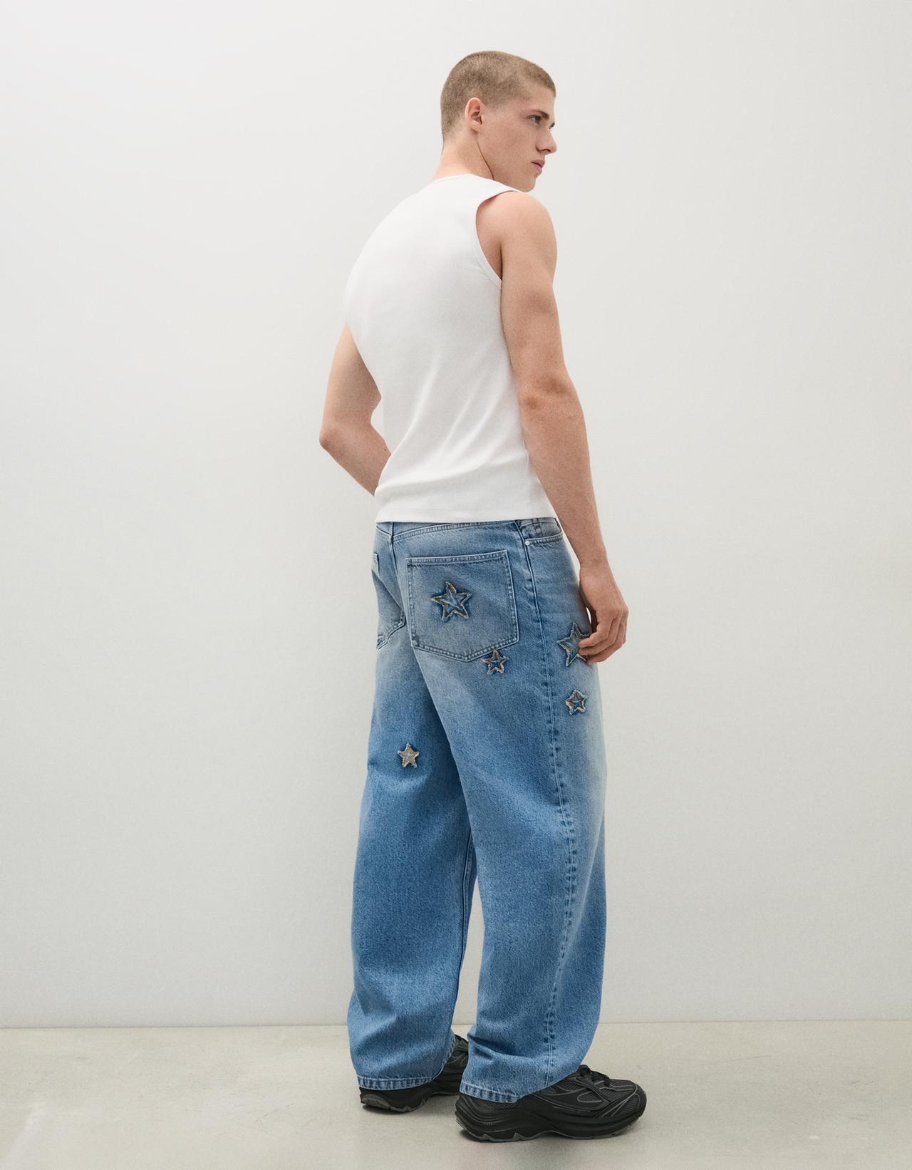 Baggy jeans with star patches — Light blue
