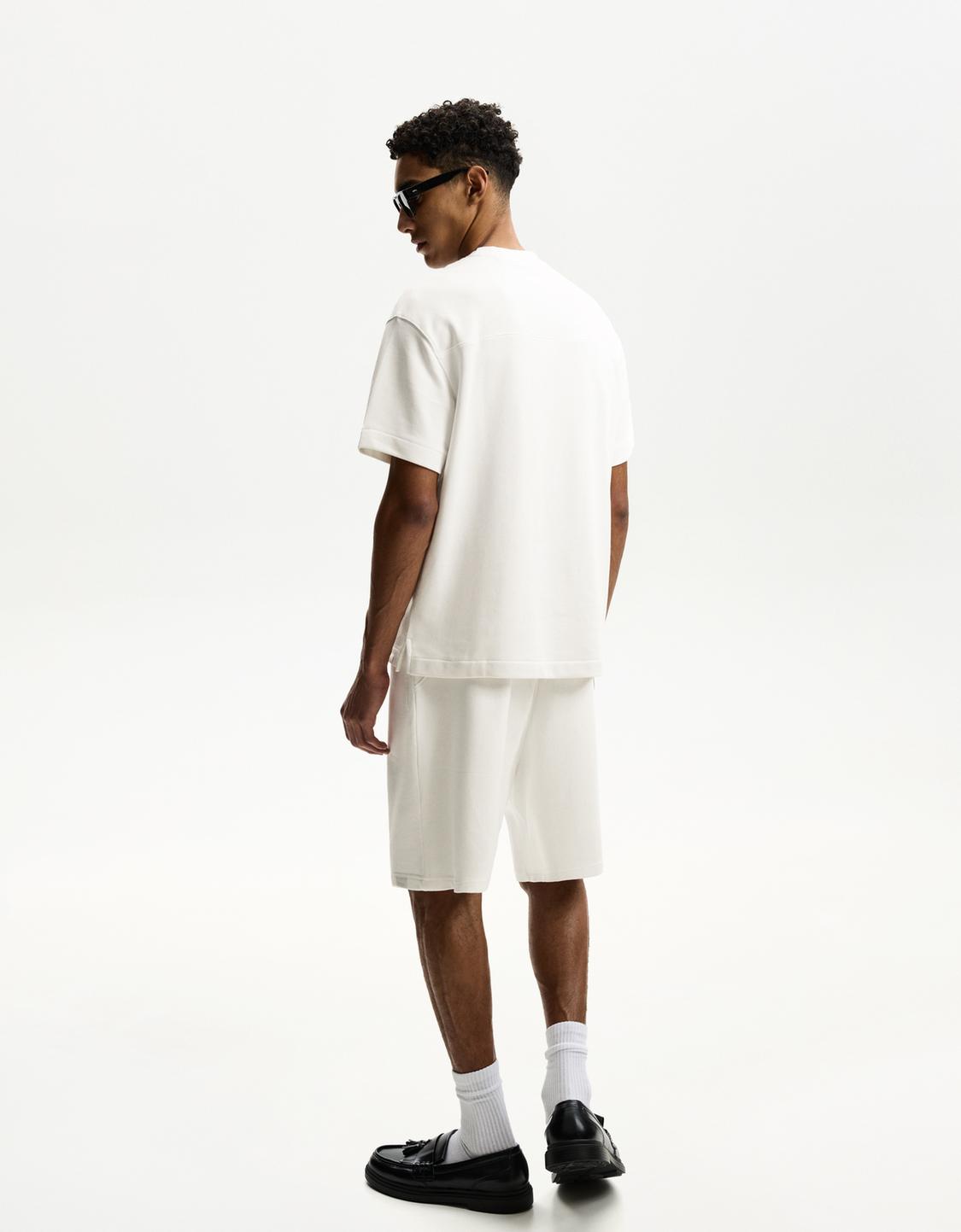 T-shirt and Bermuda shorts set