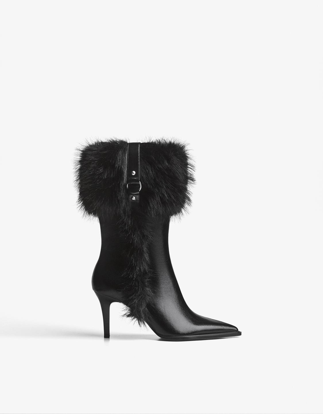 Heeled ankle boots with fur detail
