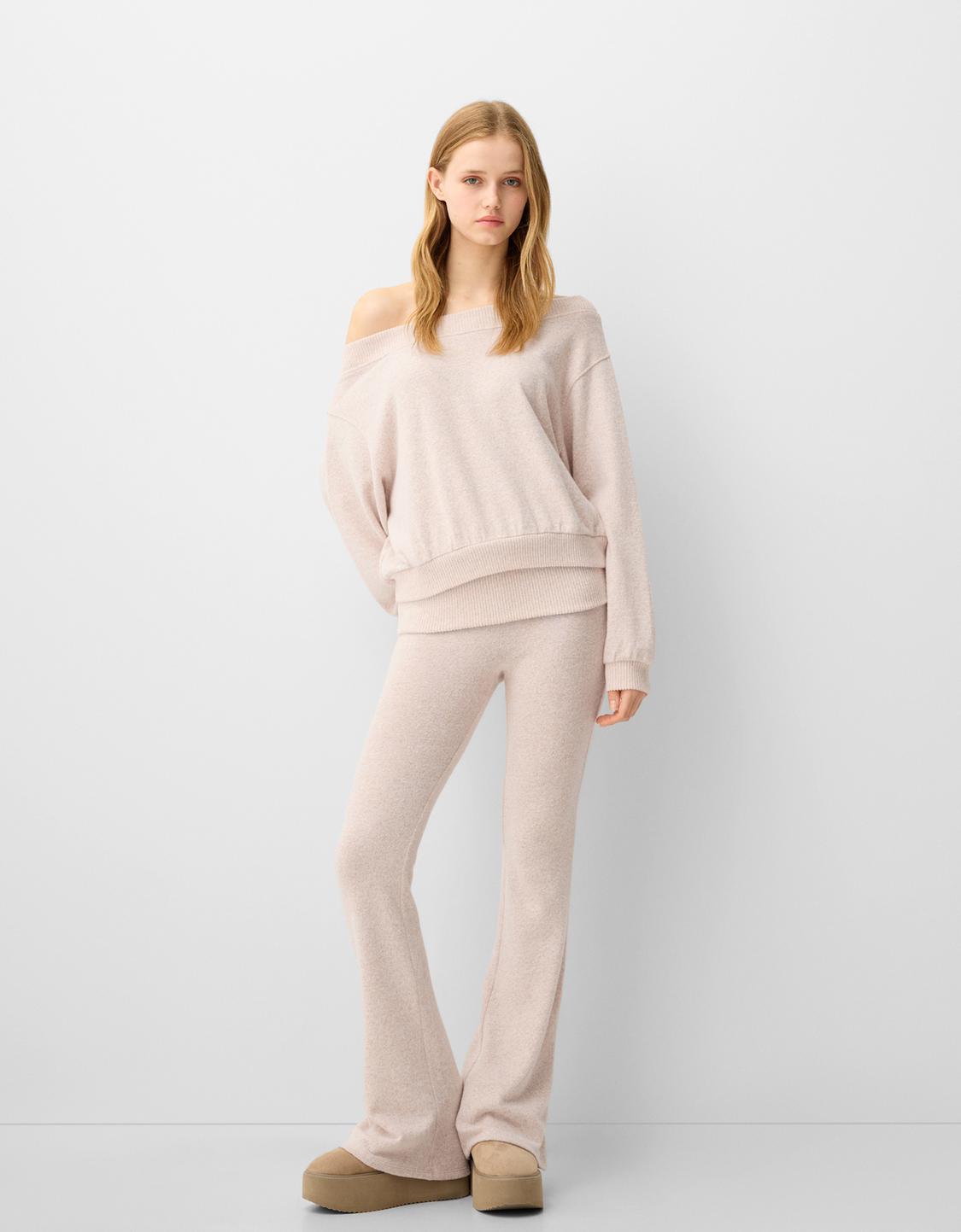 Soft-touch flared trousers with fold-over waist