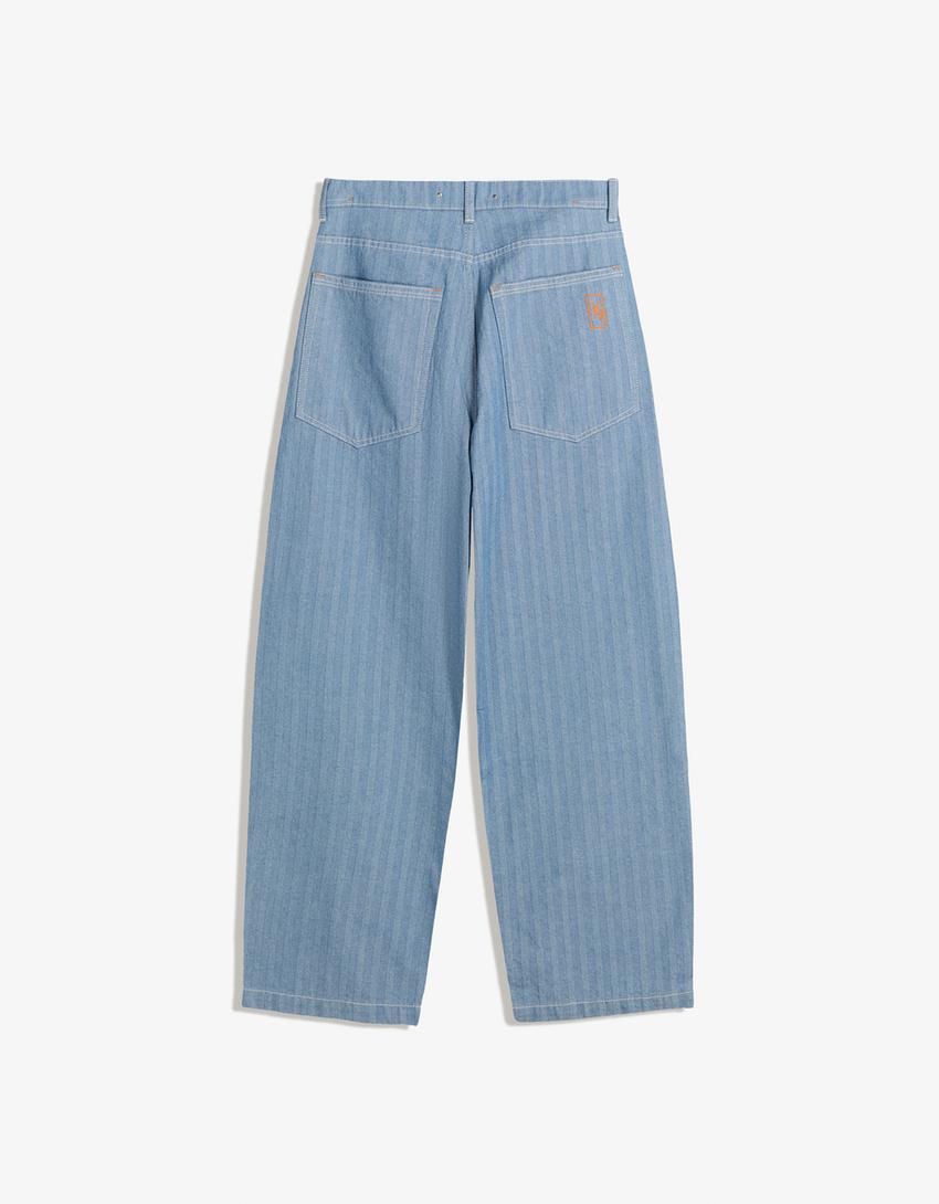 Pruhované super vrecovité džínsy