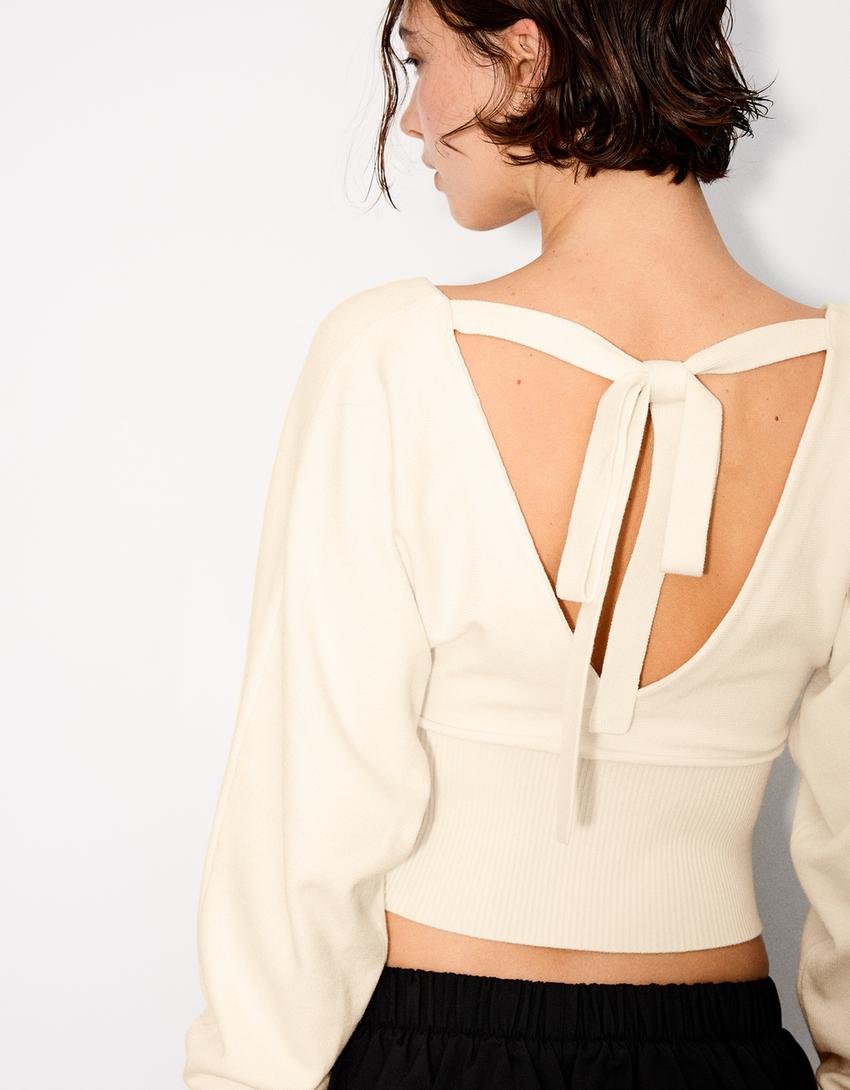 Maglia con scollo a V e laccetti-Avorio