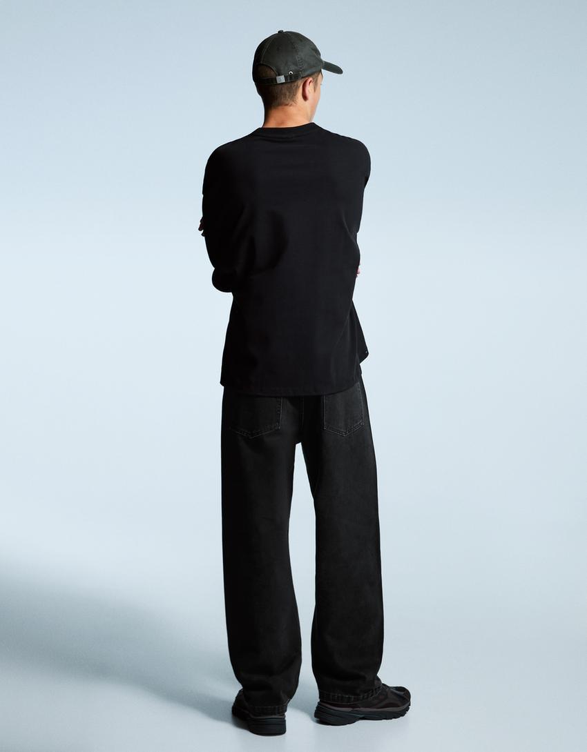 Baggy fit zımbalı jean-Siyah