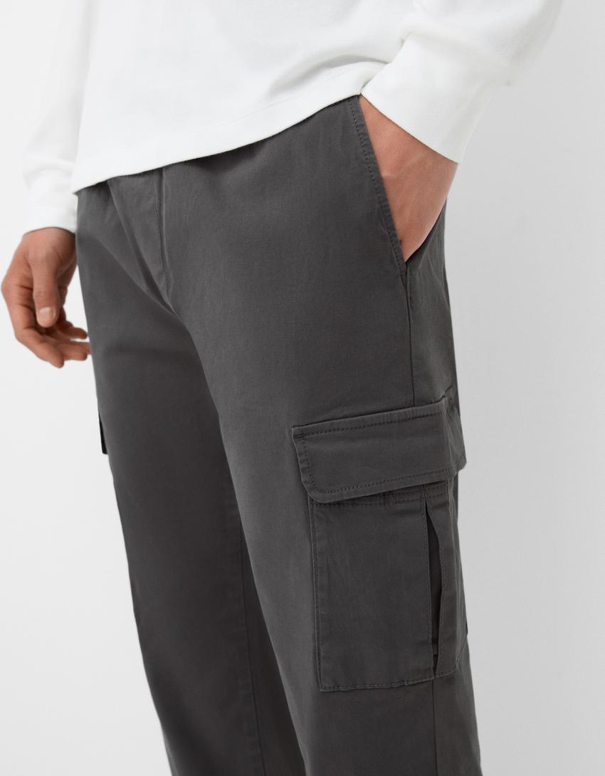 Southpole – Pantalon de jogging basique en polaire pour homme avec poches cargo, Gris chiné, X-Large Southpole – Pantalon de jogging basique en polaire pour homme avec poches cargo, Gris chiné, X-Large