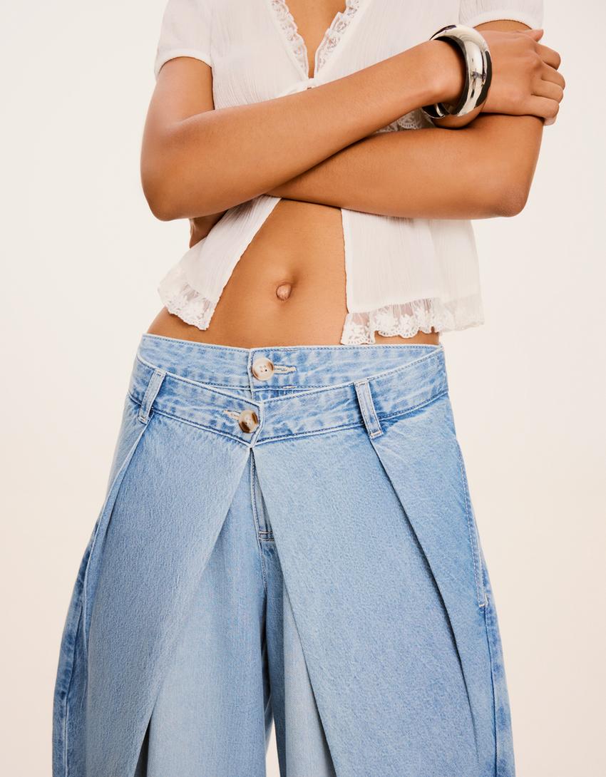 Twisted Jeans mit Puffärmeln und tiefem Bund-Ausgewaschenes Blau