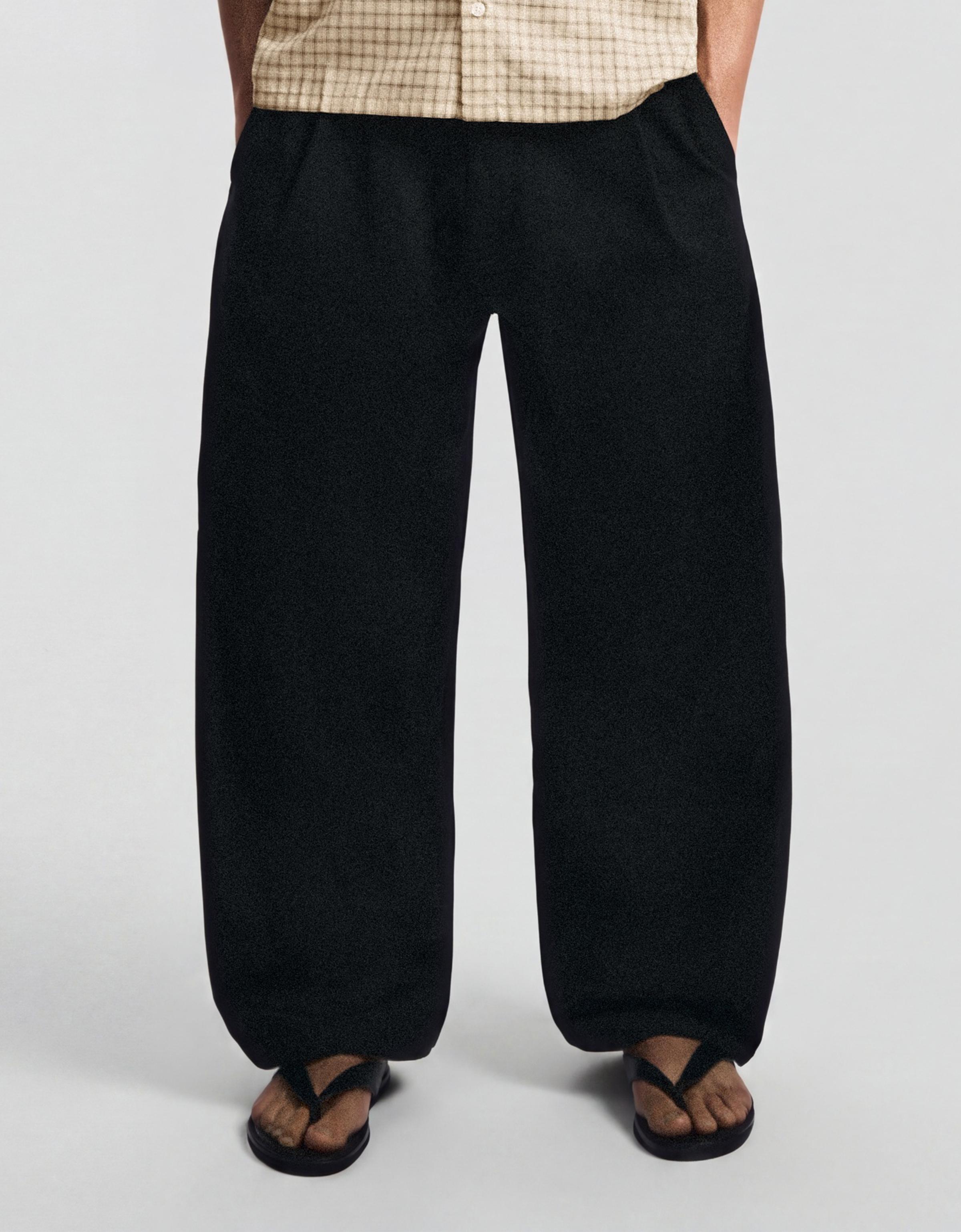 Darted barrel leg trousers — Black