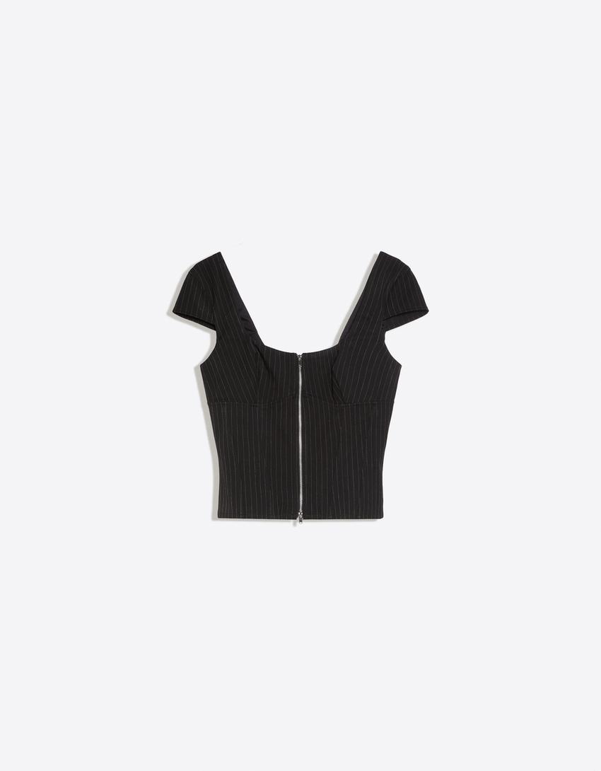 Top maniche corte con zip-Bianco / Nero