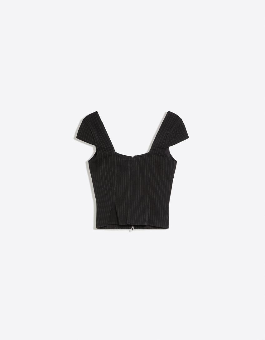Top maniche corte con zip-Bianco / Nero