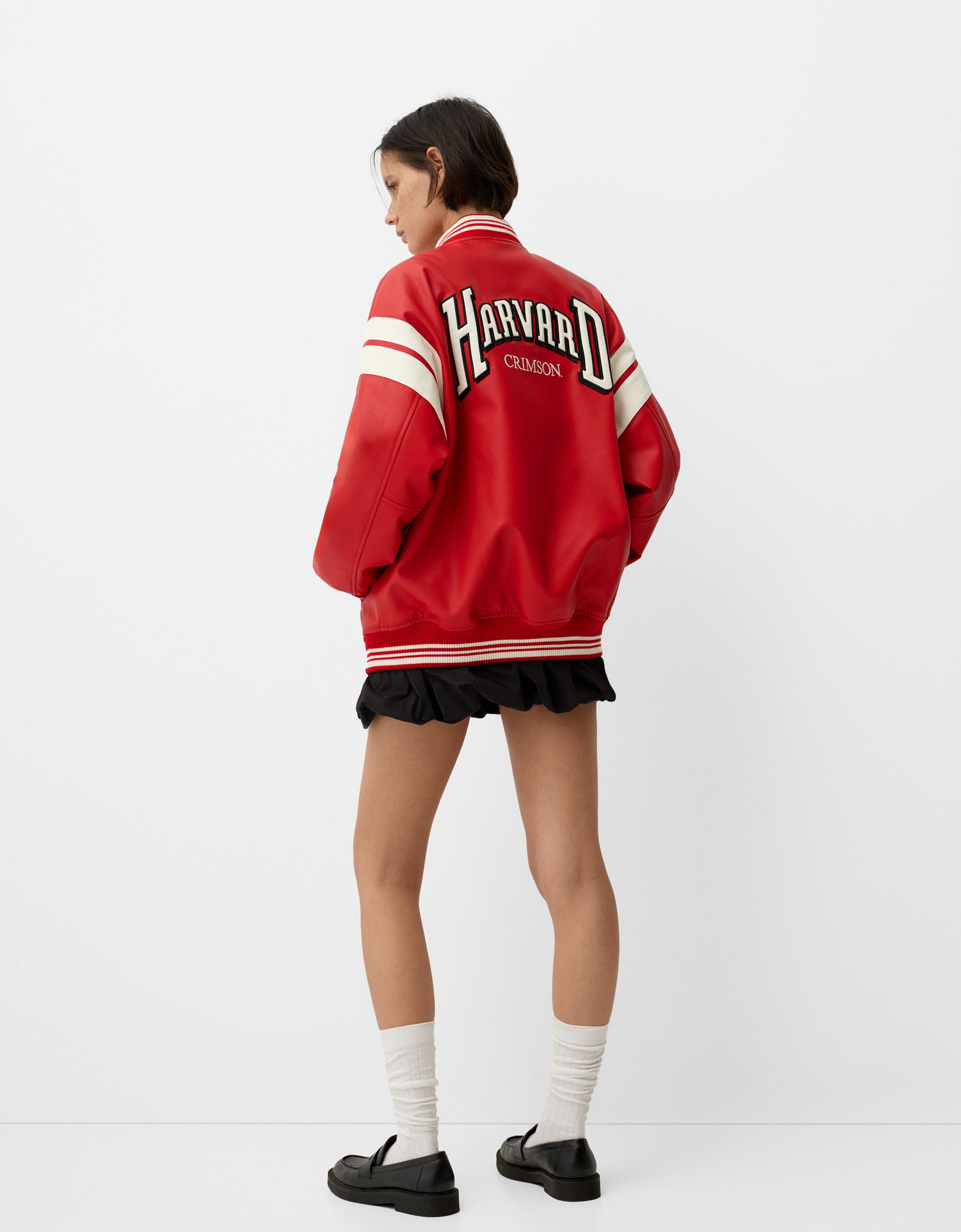 Oversize leather effect varsity jacket Women Bershka