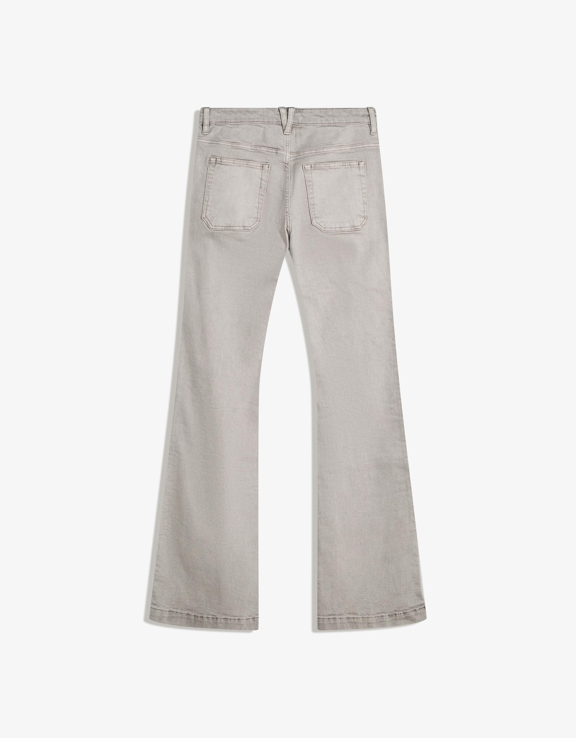 Flare trousers with flaps and pocket
