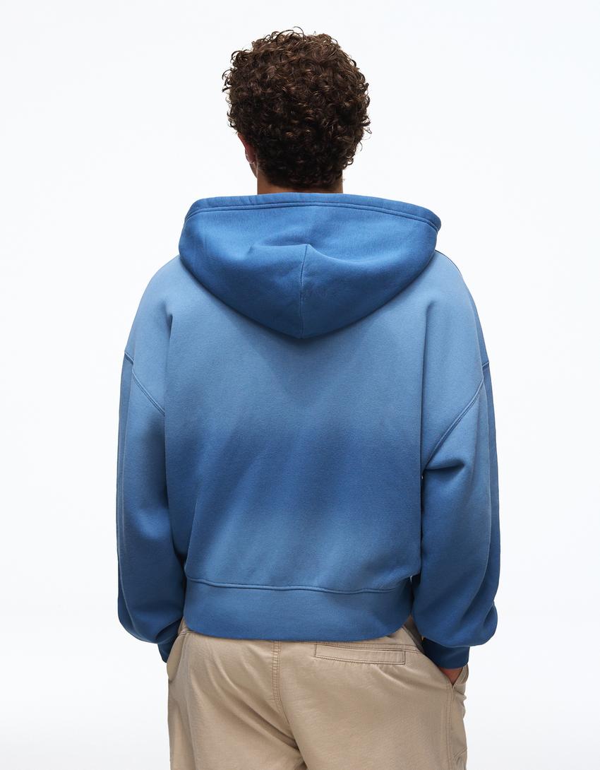 Hoodie in Washed-Optik mit Print-Blau